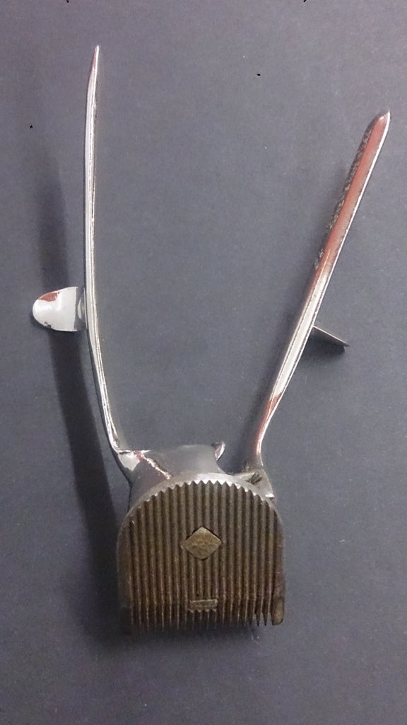 Handheld Hair Clipper Model 105/Manufactured by John Oster MFG. Co
