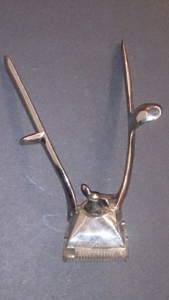 Handheld Hair Clipper Model 105/Manufactured by John Oster MFG. Co