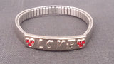 Stretchable Bracelet, Embossed Love, Two Hearts, Six Red Stones - Roadshow Collectibles