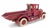 Toy Red Dump Truck, Cast Iron, Male Driver - Roadshow Collectibles