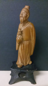 Shanghai China Hand Carved Bamboo Figure Of a Asian Male Holding a Small Sack - Roadshow Collectibles