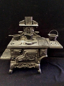 Mini Crescent Salesman Sample Cook Stove with Mini Cast Iron Cookware - Roadshow Collectibles