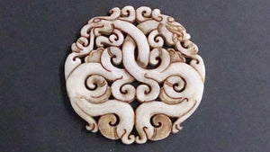 Pendant, Hand Carved White Jade, Two Dragons Intertwined Together - Roadshow Collectibles