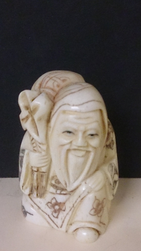 Netsuke, Carved Bone, a Bearded Old Man Holding a Sack, Japanese - Roadshow Collectibles