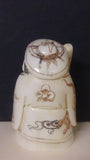 Netsuke, Carved Bone, a Man Wearing a Hat Carrying a Flute, Japanese - Roadshow Collectibles